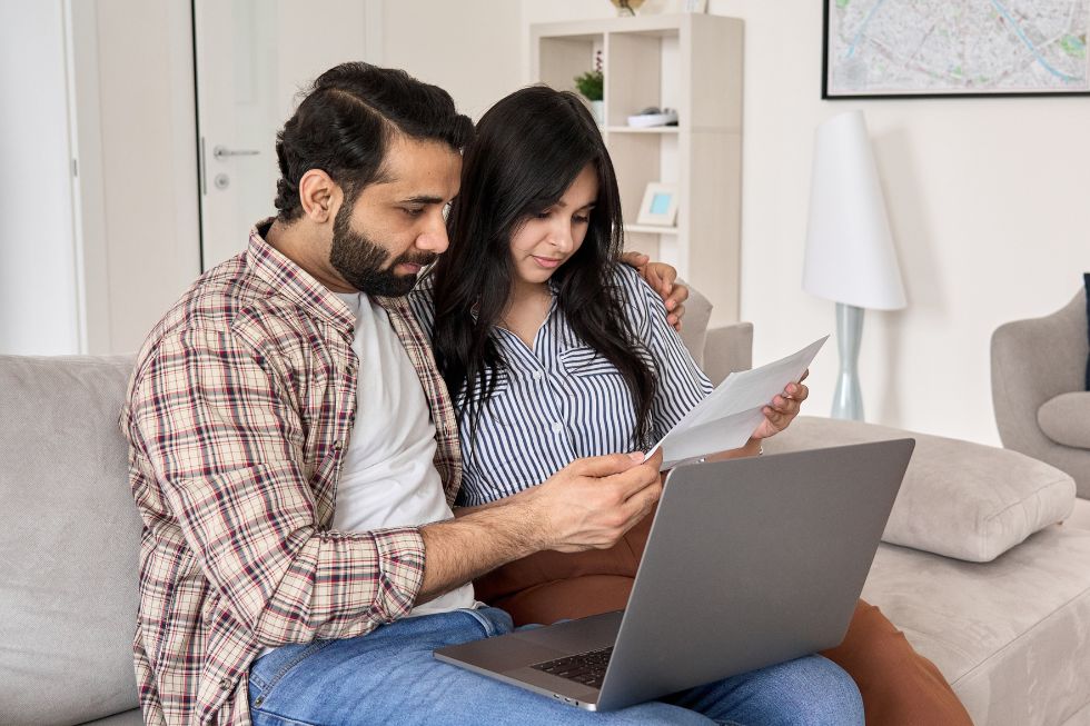 couple reading paper